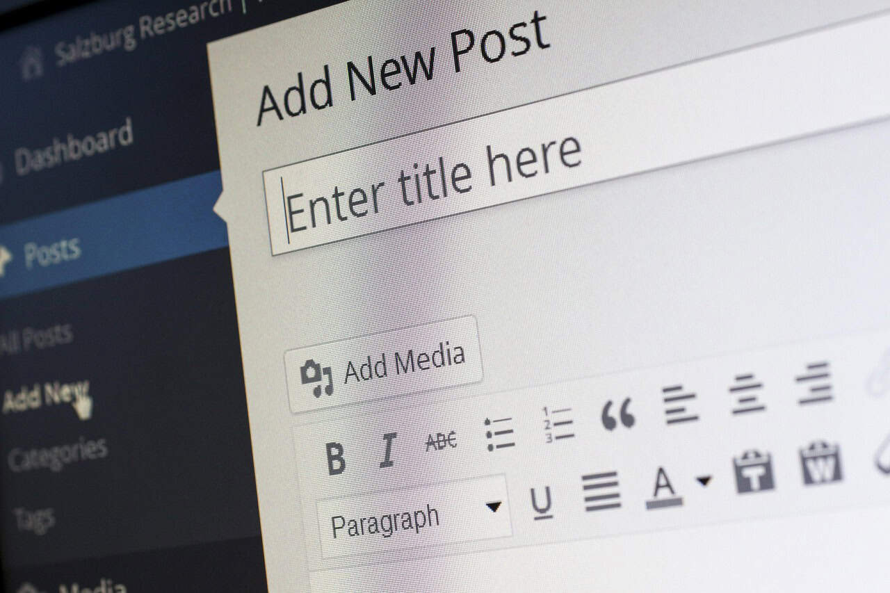 Website content management interface for adding new blog posts SEO keyword-rich digital marketing site content creation and management relevance.